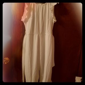 A Short white jumper (Never worn)